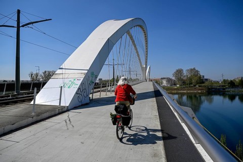 Cyclist on the Beatus-Rhenanus-Bridge, tram bridge over the Rhine, Kehl, Ortenaukreis,