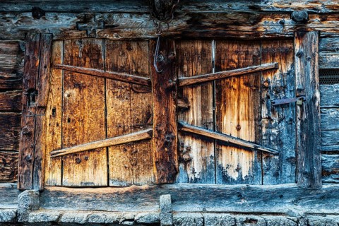 Weathered loading door of an old hay barn, Grimentz, Val d'Anniviers, Valais Alps, Canton Valais,