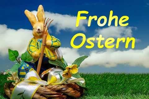 Easter greetings: Easter bunny with colourful Easter eggs with text FROHE OSTERN (Composing)