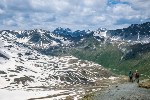 Stilfserjoch, Vinchgau, South Tyrol, Italy -Hiker on a hiking trail above the Stilfser Joch pass