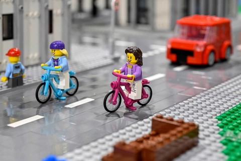 Lego figure with bicycle