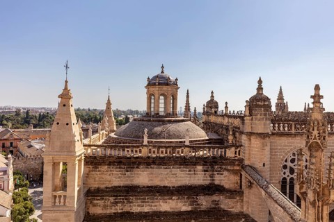 Gothic cathedral with towers and rich architecture in an urban setting, Seville