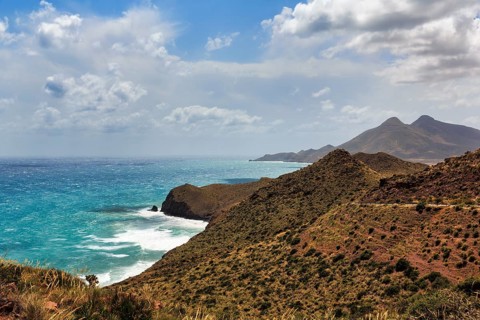 Mirador de La Amatista with views of the rocky coast and turquoise sea, coastline at La Isleta,