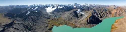 Mountain panorama, aerial view, 4000 metre peak with glacier, mountain pass and mountain lake