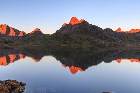 Mountains reflected in fjord, morning light, sunny, autumn, Annfjord, Vesteralen, Norway, Europe