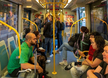 People on metro tram train public transport system, city of Porto, Portugal, Europe
