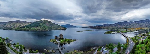 Panorama of Eilean Donan Castle and Loch Duich from a drone, Isle of Skye, Highlands, Scotland,