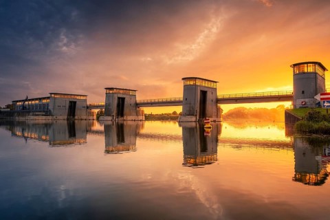 View of the Langwedel hydroelectric power station at sunset, Langwedel, Verden, Lower Saxony,