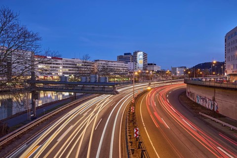 Motorway, modern architecture, river Saar, light traces, reflectors, headlights, blue hour, blue