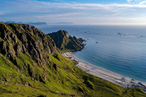 View of picturesque coastal landscape, Høyvika beach and sea, hike to the summit of Måtind, Andøya