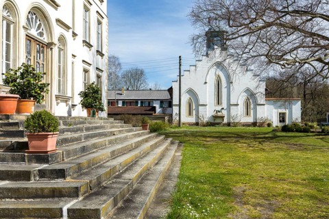 Park view of Lützschena Castle, in the background the stables, Leipzig, Saxony, Germany, Europe