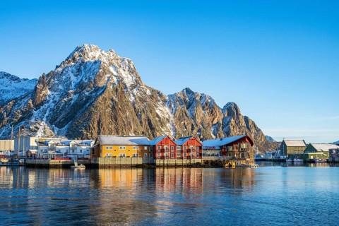 View of Svolvaer, harbour, snow-covered mountains in the background, Austvågøy, Lofoten, Norway,