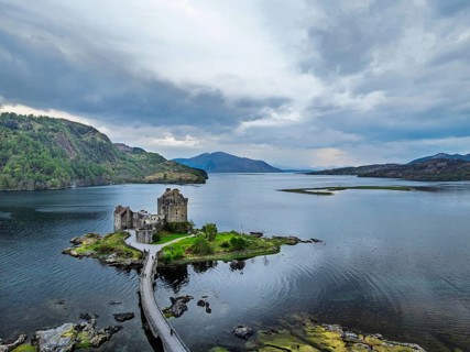 Eilean Donan Castle and Loch Duich from a drone, Isle of Skye, Highlands, Scotland, England, United