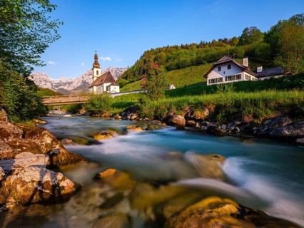 Parish church of St Sebastian on the Ramsauer Ache in the morning, Reiteralpe at the back, Ramsau,