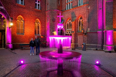 Kevelaer in the light, light installation inner courtyard of the confessional chapel with fountain