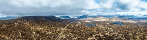 Panorama of Moors and Road A82 over Glencoe Valley from a drone, Highland, Scotland, United