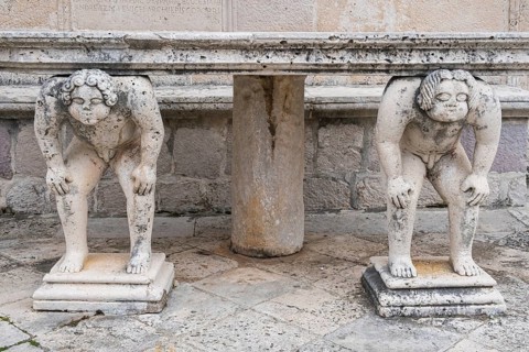 Table supported by stone sculptures, Island of Mary of the Rock, Gospa od Skrpjela, World Natural
