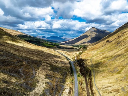 Montaims over West Highland Way A82 from a drone, Clifton, Crianlarich, Highland, Scotland, UK