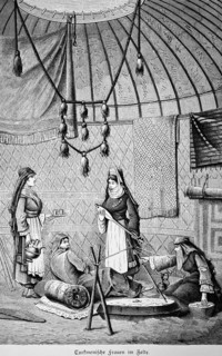 Turkmen family in tent, four woman in portrait, playing stringed instrument, preparing tea, tray