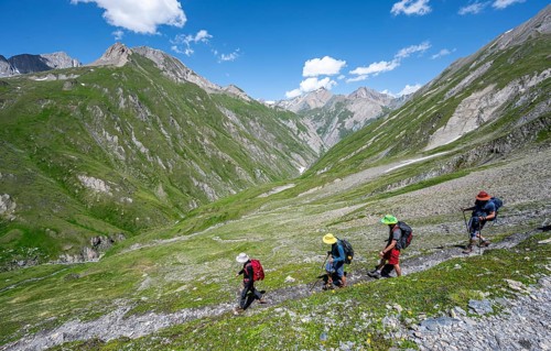 Group of mountaineers on a hiking trail, view of the Dabertal valley, Lasörling Höhenweg, Lasörling