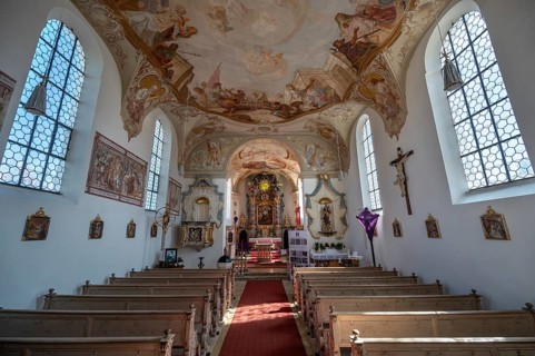 Church interior with ceiling frescoes and altar with Lenten cloth, St Laurentius and Agatha Church,