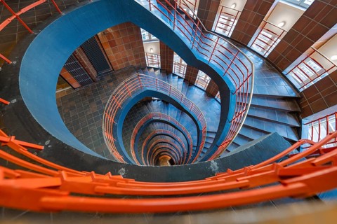Spiral staircase with red banisters, vertical view downwards, SPRINKENHOF, Hamburg, Germany, Europe