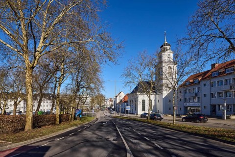 Friedenskirche Saarbrücken, bare trees, apartment buildings, street, blue sky, cloudless,
