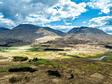 Mountains and Moors over Loch Tulla and River Orchy from a drone, Highlands, Scotland, UK