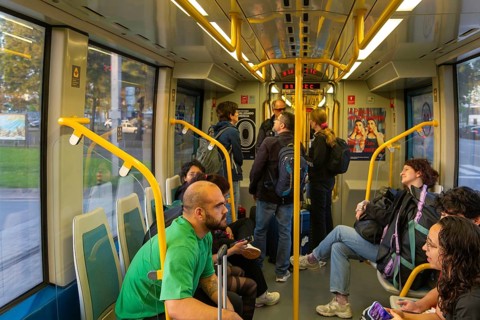 People on metro tram train public transport system, city of Porto, Portugal, Europe