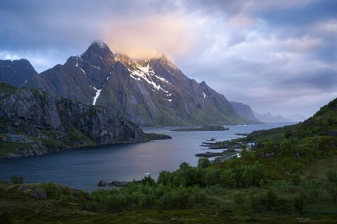 Mountain landscape on the Lofoten Islands. View across the Maervollspollen fjord to mountains in