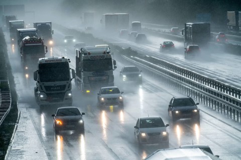 A2 motorway, at Recklinghausen motorway junction, heavy traffic during a thunderstorm, North