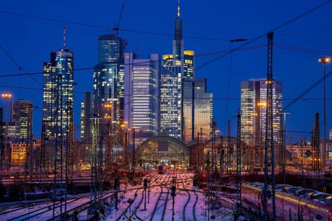 Railway tracks in front of the main railway station in Frankfurt am Main, skyline of skyscrapers in