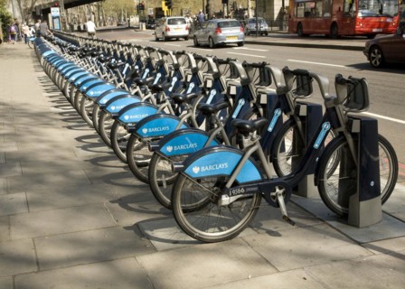 Racks of bikes available for rental under Barclays bicycle hire scheme, London