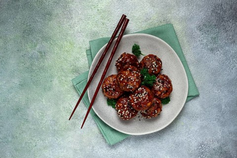 Tsukune, Japanese meatballs, minced chicken, fried on a skewer, with yakitori sauce, homemade, no