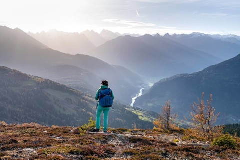Hiker on the Venet, Upper Inn Valley in the morning light, view from Venet, Ötztal Alps, Tyrol,