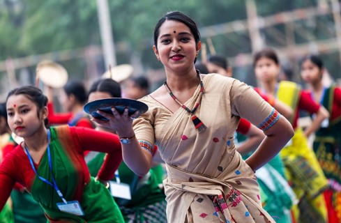 Participants with instructor dance in a Bihu dance workshop ahead of Rongali Bihu Festival, in
