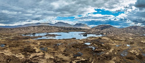 Panorama of Rannoch Moor from a drone over Loch Ba and Loch of the Armpit, A82 Highland Way, Argyll