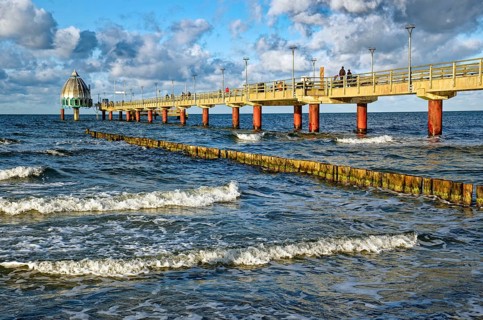 Diving gondola at the Zingst pier, cloudy mood and waves, Baltic Sea coast, Zingst,