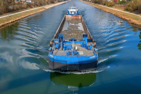 Cargo ship on the Main-Danube Canal, Möhrendorf, Bavaria, Germany, Europe