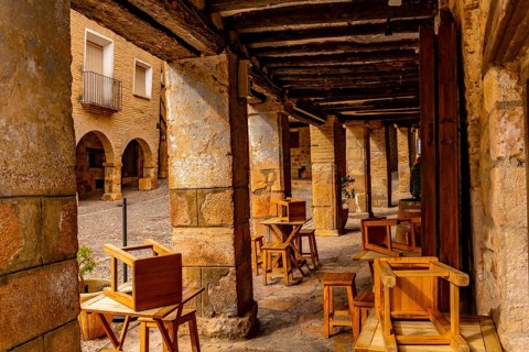 Picturesque Rafael Ayerbe square. Old Plaza Mayor of the Pyrenean town of Alquezar, Huesca, Spain,