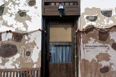 Fishing nets on house wall, facade with door, cottage, Arrieta, Haria, Lanzarote