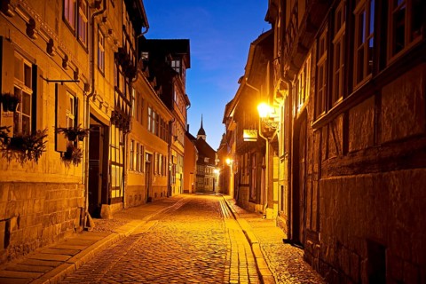 Half-timbered houses in a narrow street with cobblestones, Old Town in the evening, World Heritage
