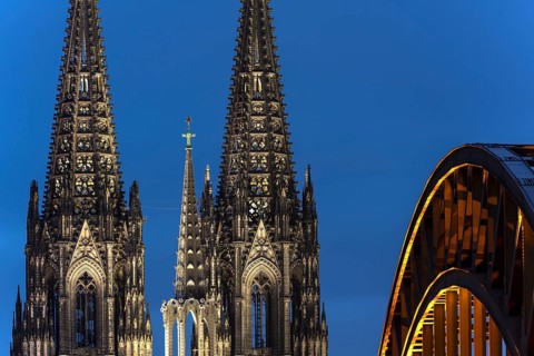 Cologne Cathedral and the Hohenzollern Bridge illuminated with LED lights, Cologne, North