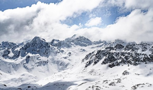 View at the summit of Piz Laviner, mountain panorama in winter, mountain landscape with mountain