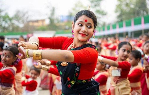 Participants with an instructor dance on the final day of a Bihu dance workshop ahead of Rongali