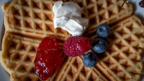 Waffle with raspberry, blueberries, strawberry jam and cream, Kongsvoll or Kongsvold Fjeldstue,