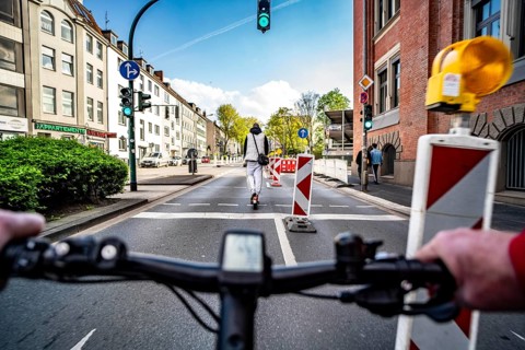Cycling in the city, city centre road, roadworks, no cycle path, two-lane traffic in both