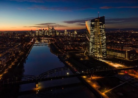 The lights in the offices of the European Central Bank (ECB) and in the skyscrapers of Frankfurt's