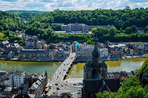 Aerial view of Dinant town, Collegiate Church of Notre Dame de Dinant, River Meuse and Pont Charles