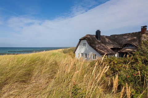 Thatched roof house in the dunes on the beach, Baltic Sea, Ahrenshoop, Fischland,